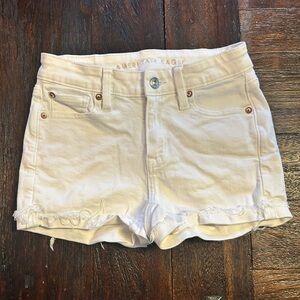 American Eagle Outfitters Next Level Stretch High V-Rise White Jean Shorties